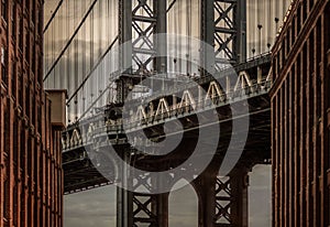 Manhatten bridge from the streets of brooklyn