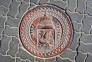 Manhole cover with dragon image, Kazan, Tatarstan, Russia