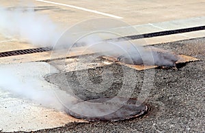 Manhole Cover with Steam Escaping