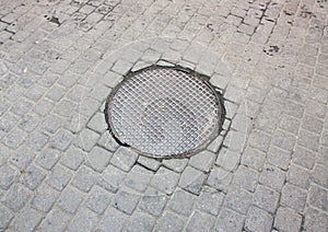Manhole cover on the street.