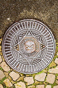 Manhole Luxembourg cobblestone