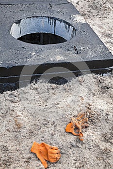 Manhole and protective gloves