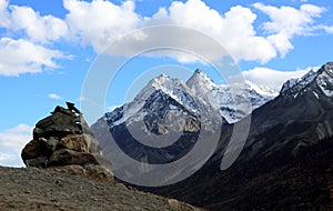 Mani stone on the mountain top photo