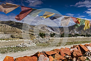 The Mani stone and prayer flags of upper Mustang  , Lo Manthang , Upper Mustang trekking , Nepal