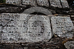 Mani Stones of Buddhism with mantra in Nepal