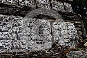 Mani Stones of Buddhism with mantra in Nepal