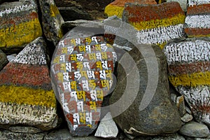 Mani Stones with Buddhist mantra in Himalaya, Nepal