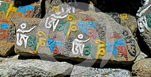 Mani Stones with Buddhist mantra in Himalaya, Nepal