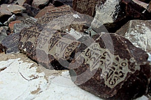 Mani stones are stone plates photo