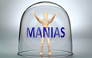 Manias can separate a person from the world and lock in an invisible isolation that limits and restrains - pictured as a human