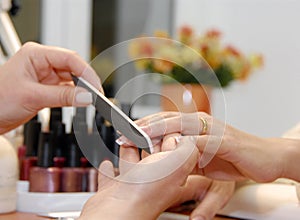 A manicure is in a beauty salon