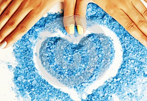 manicure with blue nails and seasalt photo