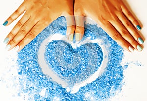 Manicure with blue nails and seasalt photo