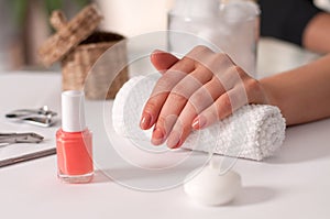 Manicure concept. Beautiful woman`s hands in the spa. Nail salon