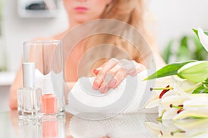 Manicure concept. Beautiful woman& x27;s hands with perfect manicure at beauty salon.