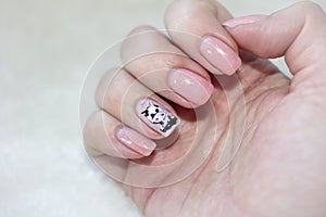 Manicure design with a drawing of a bull, the symbol of the Chinese year on the eastern calendar