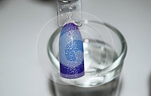 Manicure design nails varnish changes color. Thermo lacquer