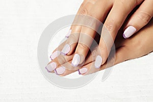 Manicure.female hands.beauty salon.shellac polish photo