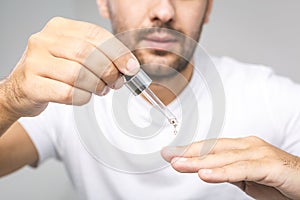 Manicure, Hands spa Cuticle oil. Beautiful man hands closeup. Manicured nails. Beauty hands