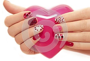 Manicure with hearts.