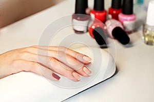 Manicure nail paint pink color