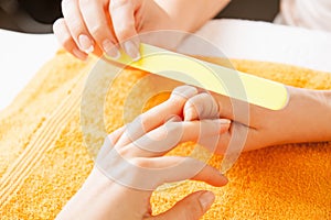 Manicure process on female hands