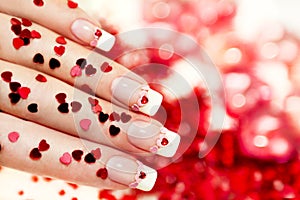 Manicure with a red heart. photo