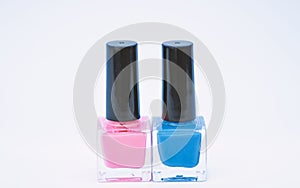 Manicure salon. Fashion trend. Nail polish bottles different colors. Beauty and care concept. Nail polish white