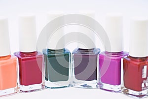 Manicure salon. Gel polish modern technology. Fashion trend. Nail polish bottles. Beauty and care concept. Durability