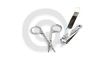 Manicure scissors and forceps isolated on white