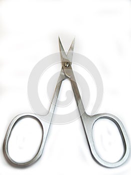 Manicure scissors for nails hand isolated on white background