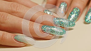 Manicure services in beauty salon.The result or final work nail painting procedure.The finish work a woman manicurist