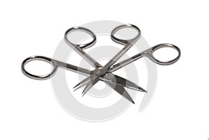 Manicure tools - scissors on white backgorund