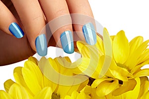 Manicured nails with natural nail polish. Manicure with blue nailpolish. Fashion manicure. Shiny gel lacquer. Spring