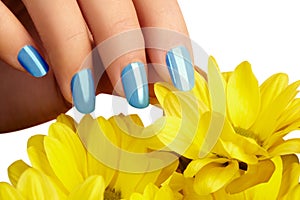 Manicured nails with natural nail polish. Manicure with blue nailpolish. Fashion manicure. Shiny gel lacquer. Spring photo