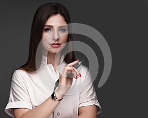 Manicurist in working form with tools in hand. Nail photo content