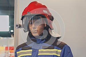 Maniken in the helmet and the form of a rescuer