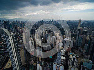 Manila Cityscape, Makati City with Business Buildings and Cloudy Sky. Philippines. Skyscrapers in Background.