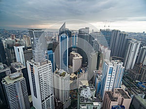 Manila Cityscape, Makati City with Business Buildings and Cloudy Sky. Philippines. Skyscrapers in Background.