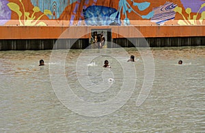 Manila, philippines, circa March 2023 - local kids swimming in pasig river