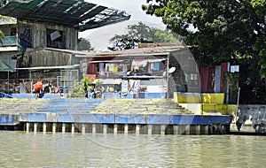 Manila, philippines, circa March 2023 - squatter homes at the pasig river