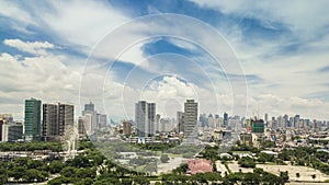 Manila, Philippines - Condominiums along Roxas Blvd. Makati City skyline at the background photo