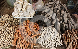 Manioc, white and purple yams for sale