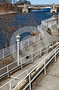 Manistee`s River Walk with a Draw Bridge in the Background