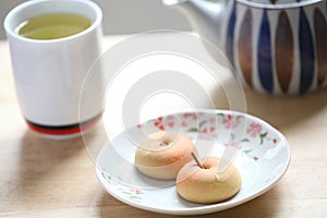 Manju with green tea photo