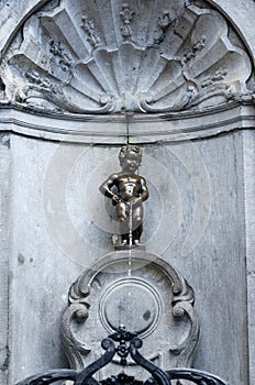 Manneken Pis (Little man Pee), a Famous bronze sculpture in Brussels