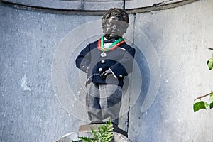 Manneken Pis statue, boy bronze sculpture in Brussels downtown