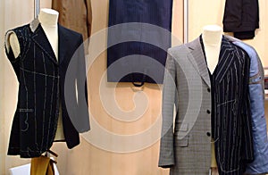 Mannequin with basted jacket by a tailor