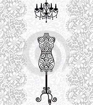 Mannequin and chandelier on lace background