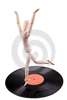 Mannequin dancing on vinyl disc